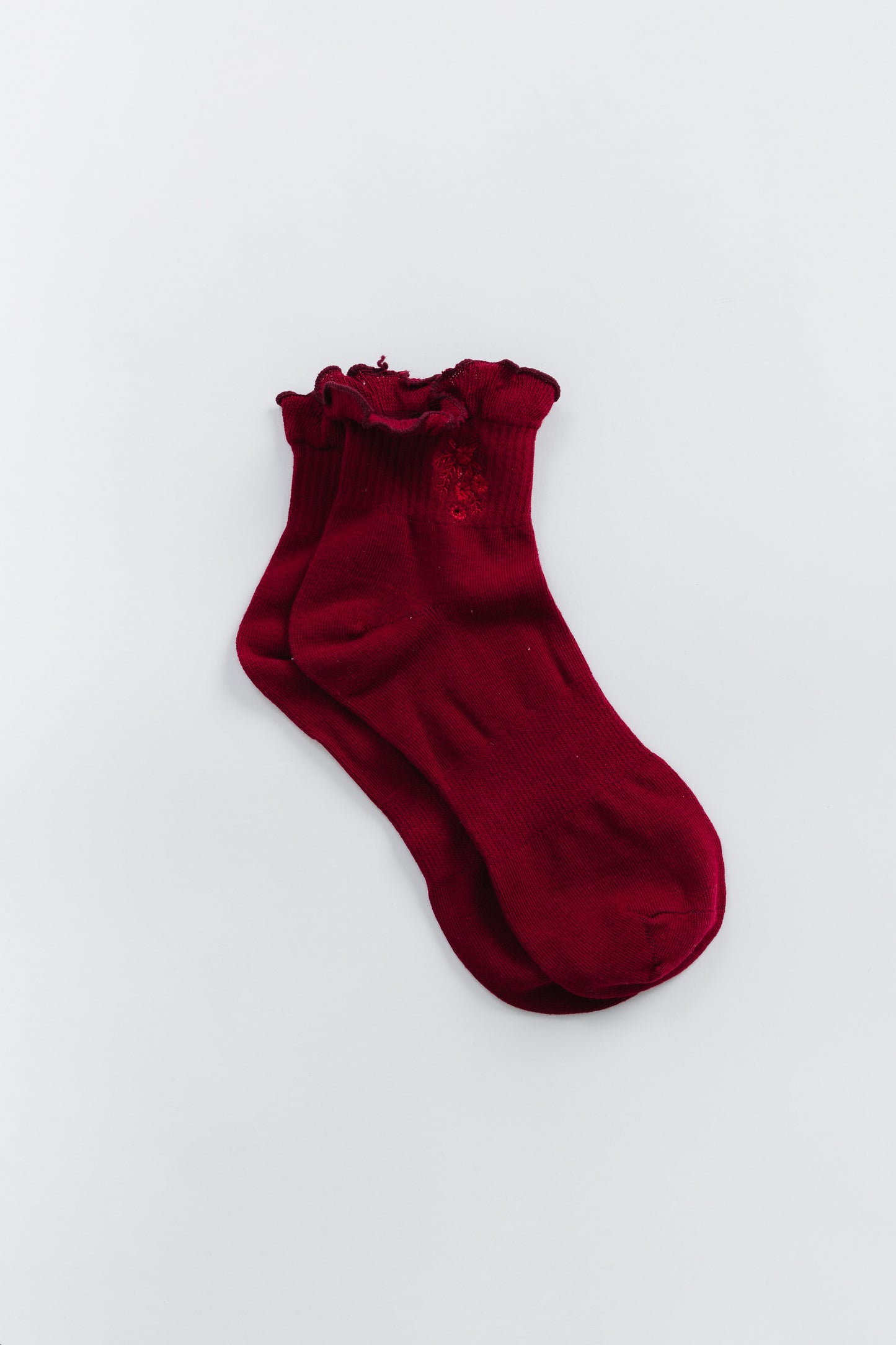 Cove Embroidered Ruffle Quarter
