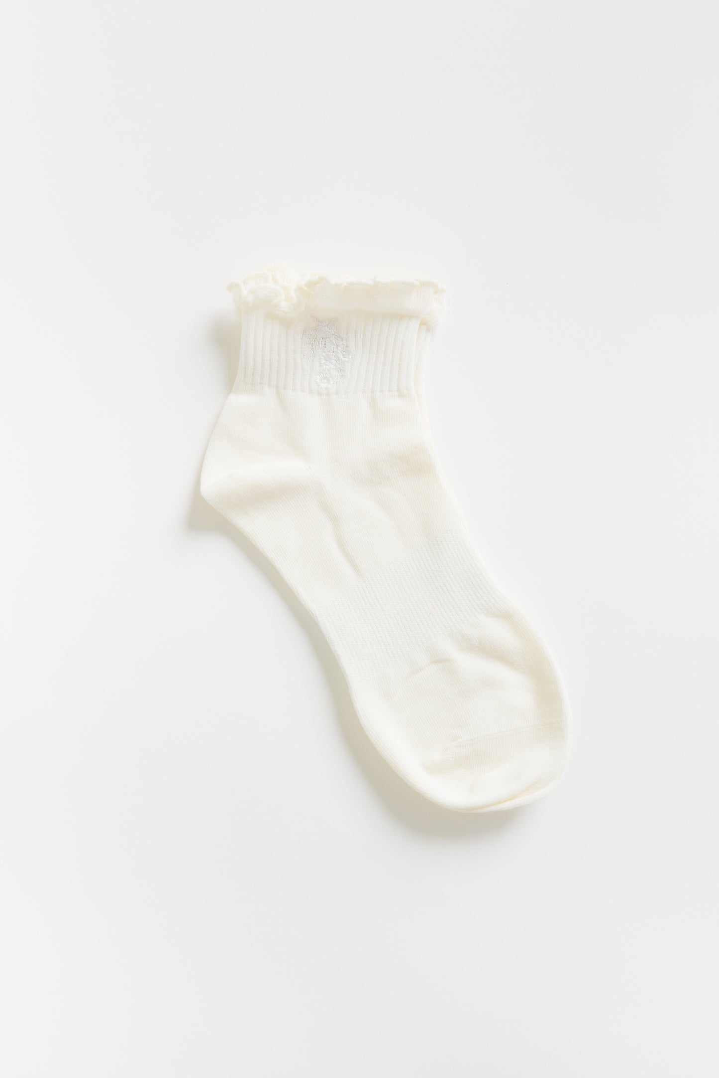 Cove Embroidered Ruffle Quarter