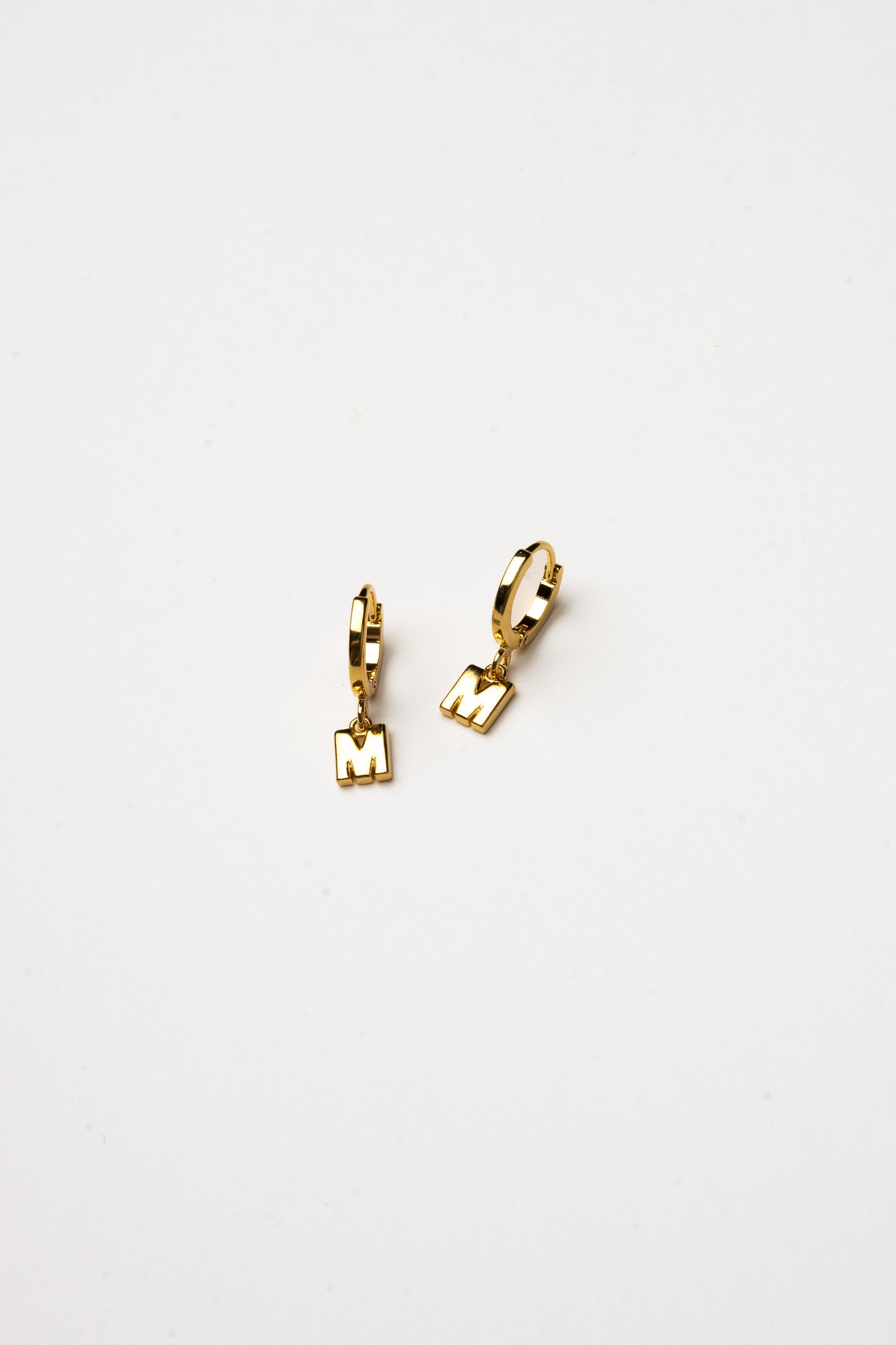 Cove Initial Letter Huggie Earrings