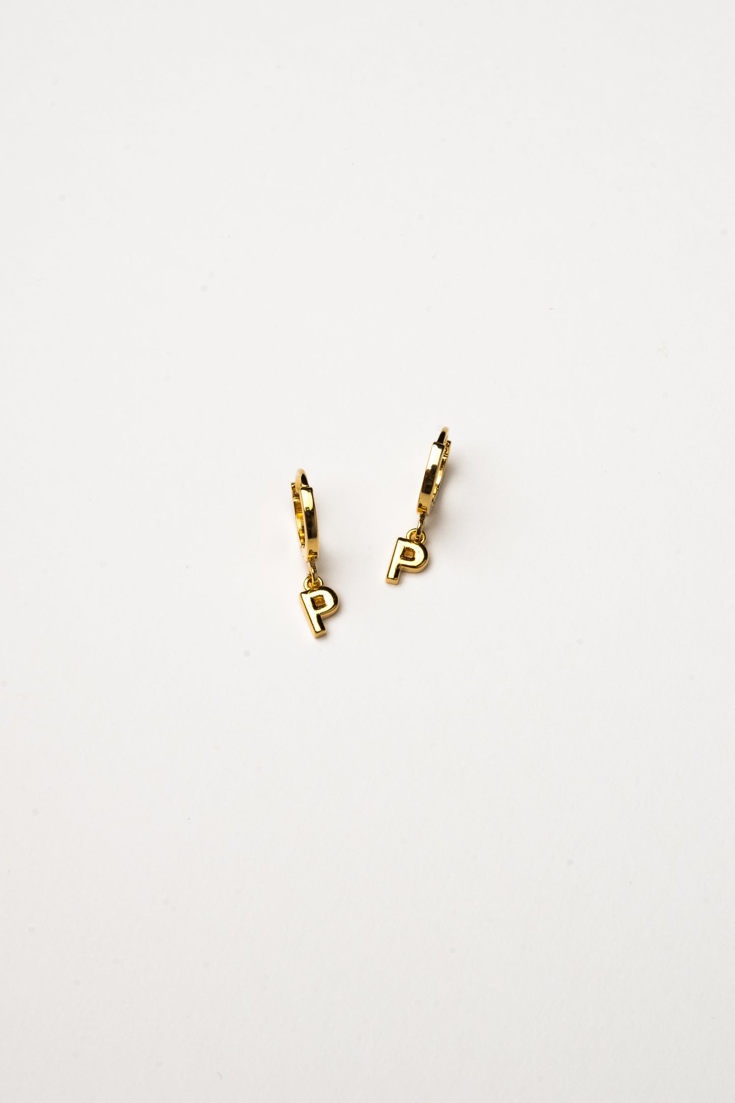 Cove Initial Letter Huggie Earrings
