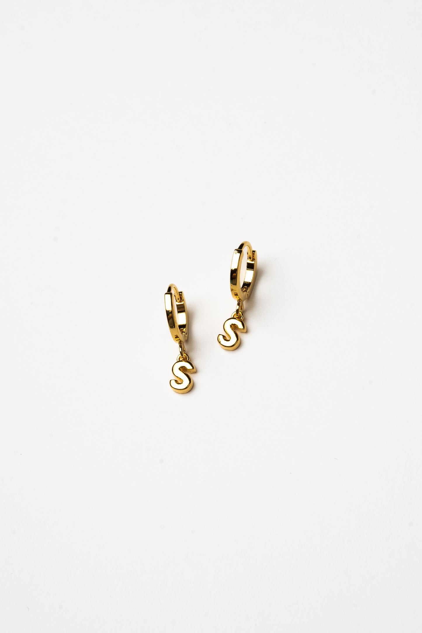 Cove Initial Letter Huggie Earrings