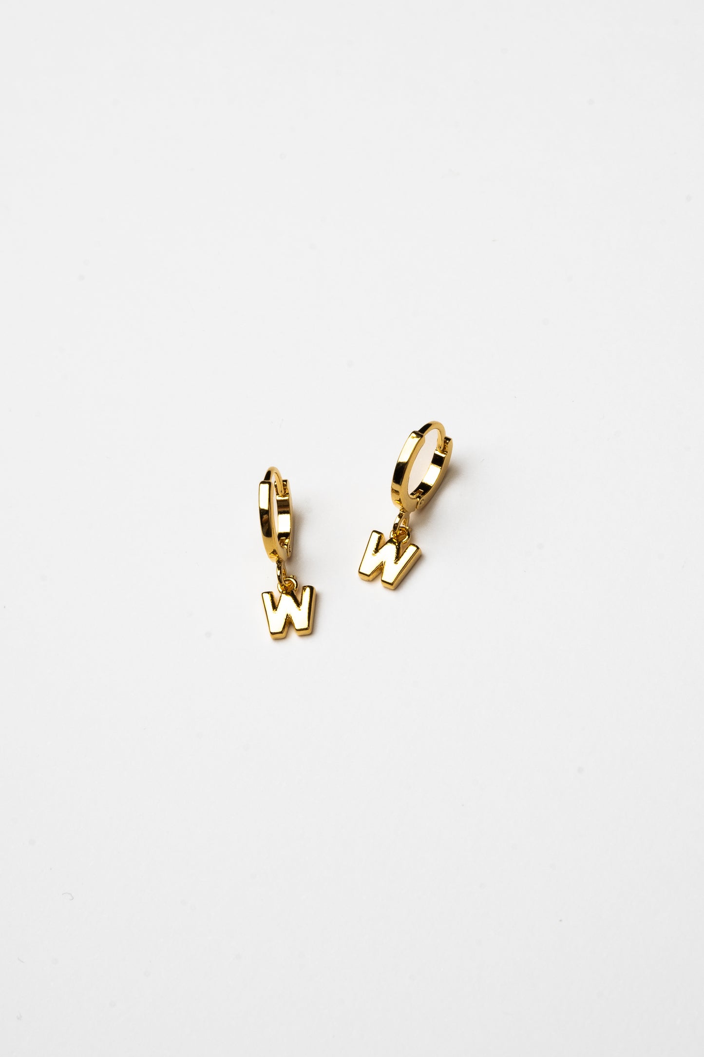 Cove Initial Letter Huggie Earrings
