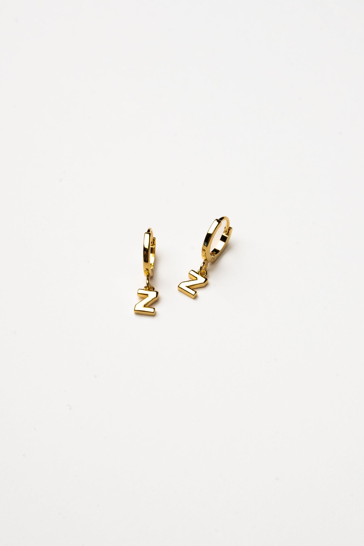 Cove Initial Letter Huggie Earrings
