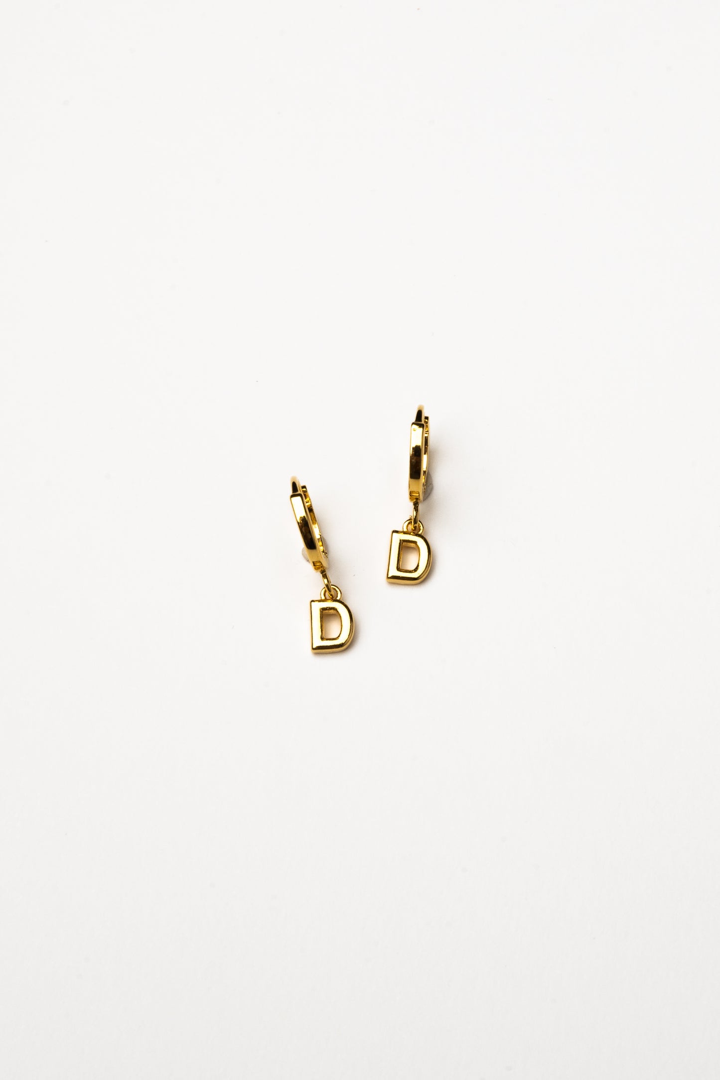 Cove Initial Letter Huggie Earrings