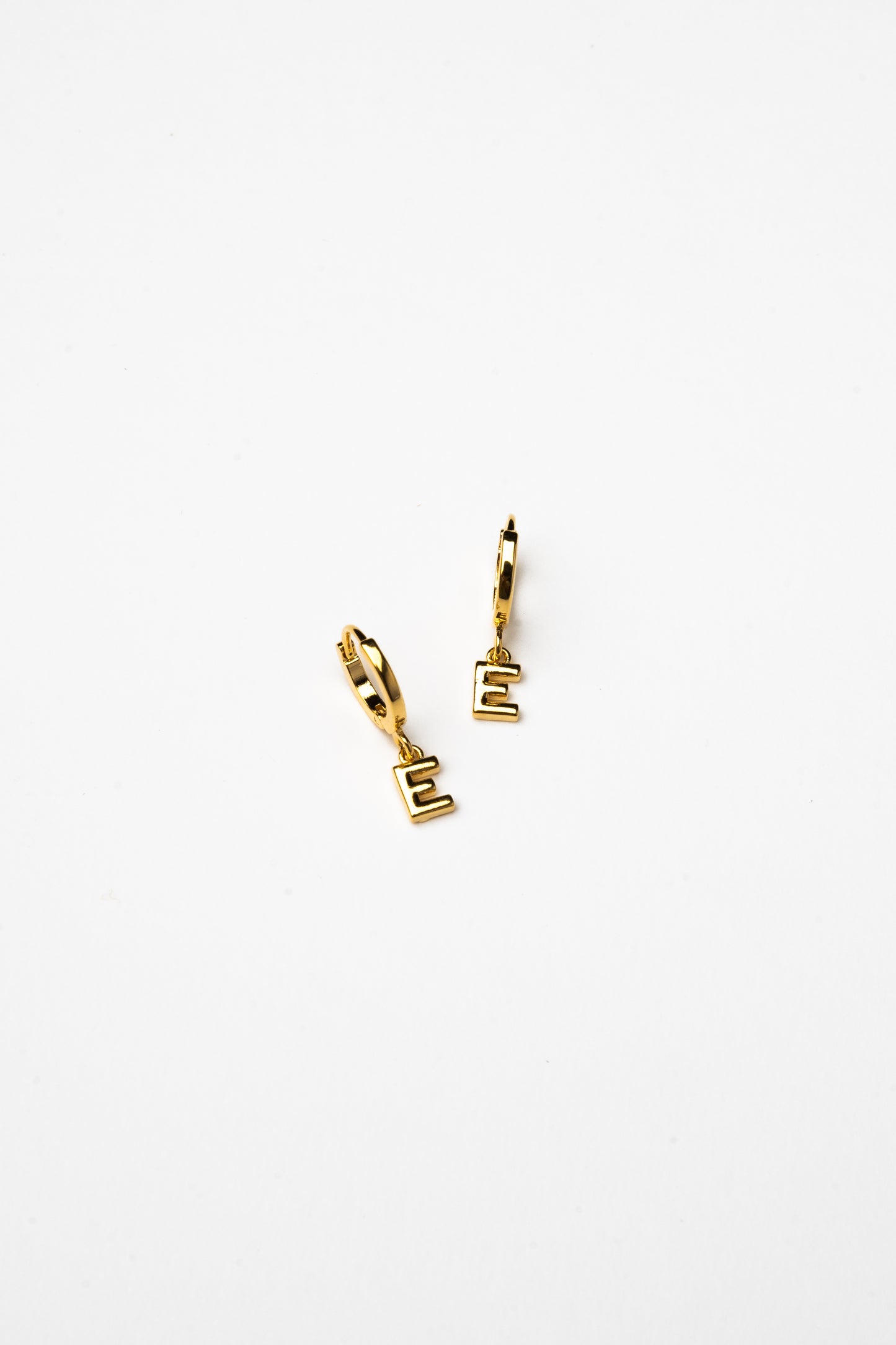 Cove Initial Letter Huggie Earrings